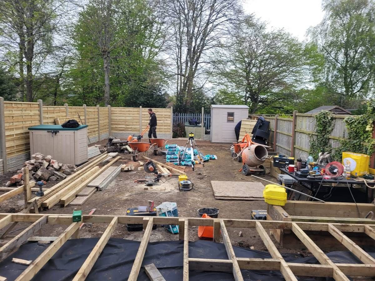 DNA Landscapes removing old decking and fitting new garden fencing in Solihull