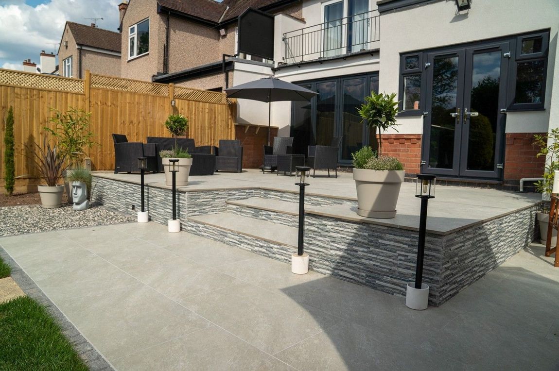 DNA Landscapes full garden design and build project completed in Earlsdon, Coventry. Includes patio, paving, garden lighting, garden fencing