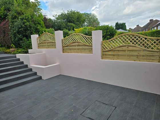 DNA Landscaping Contractors Coventry building retaining wall with garden fencing around a patio