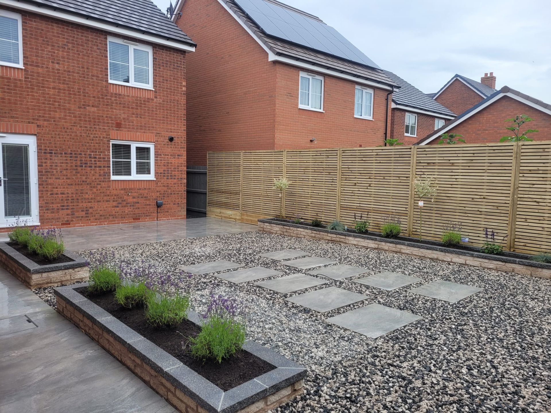 DNA Landscapes completed patio, paving and garden fencing for a garden design and build landscaping project in Solihull