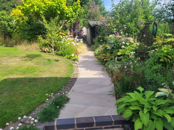 DNA Landscapes soft landscaping across a path in a garden in Coventry