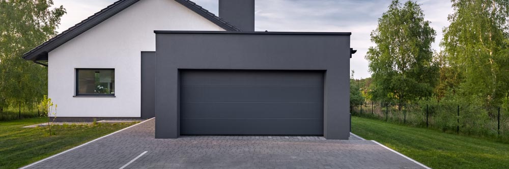 Exterior Of A Beautiful House With Garage — Garage Door Services In Yeppoon, QLD