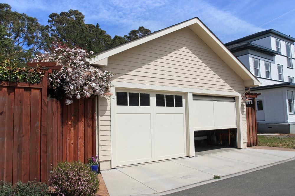 House With Two Garage Doors — Garage Door Services In Yeppoon, QLD