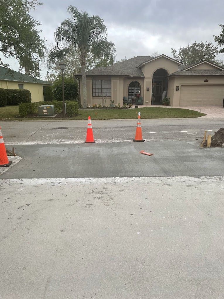 A house with a lot of traffic cones in front of it