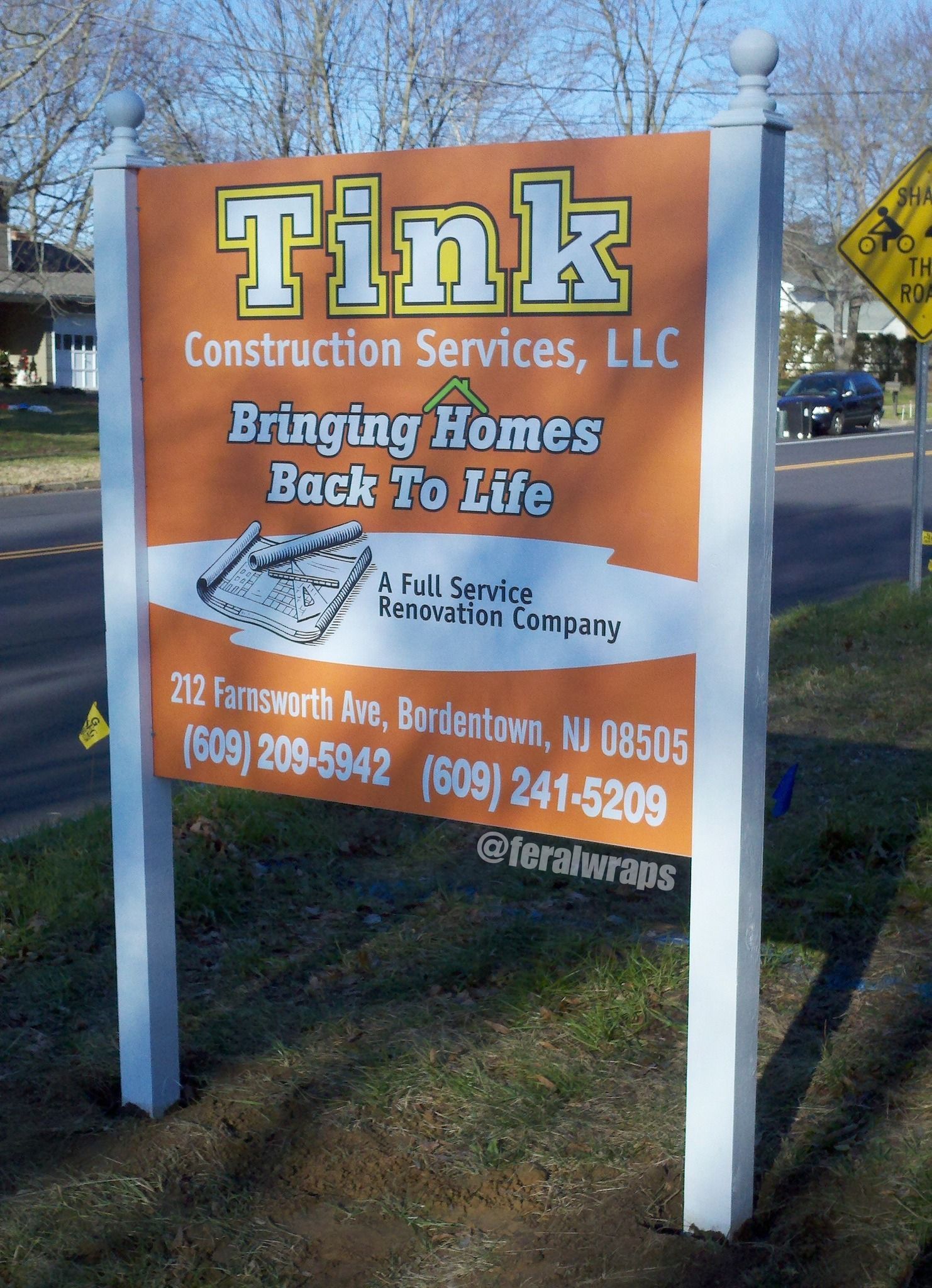 A sign for tink construction services llc bringing homes back to life