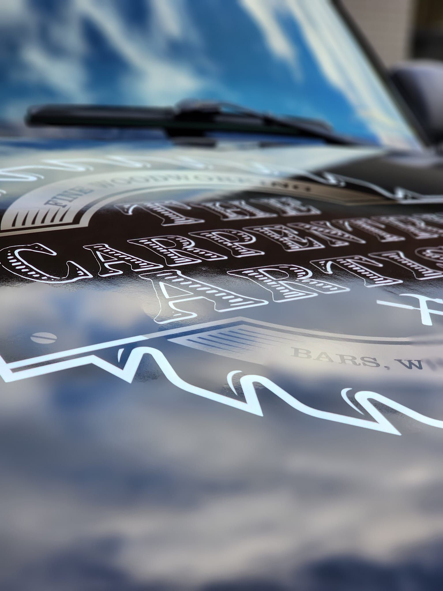 A close up of the hood of a car