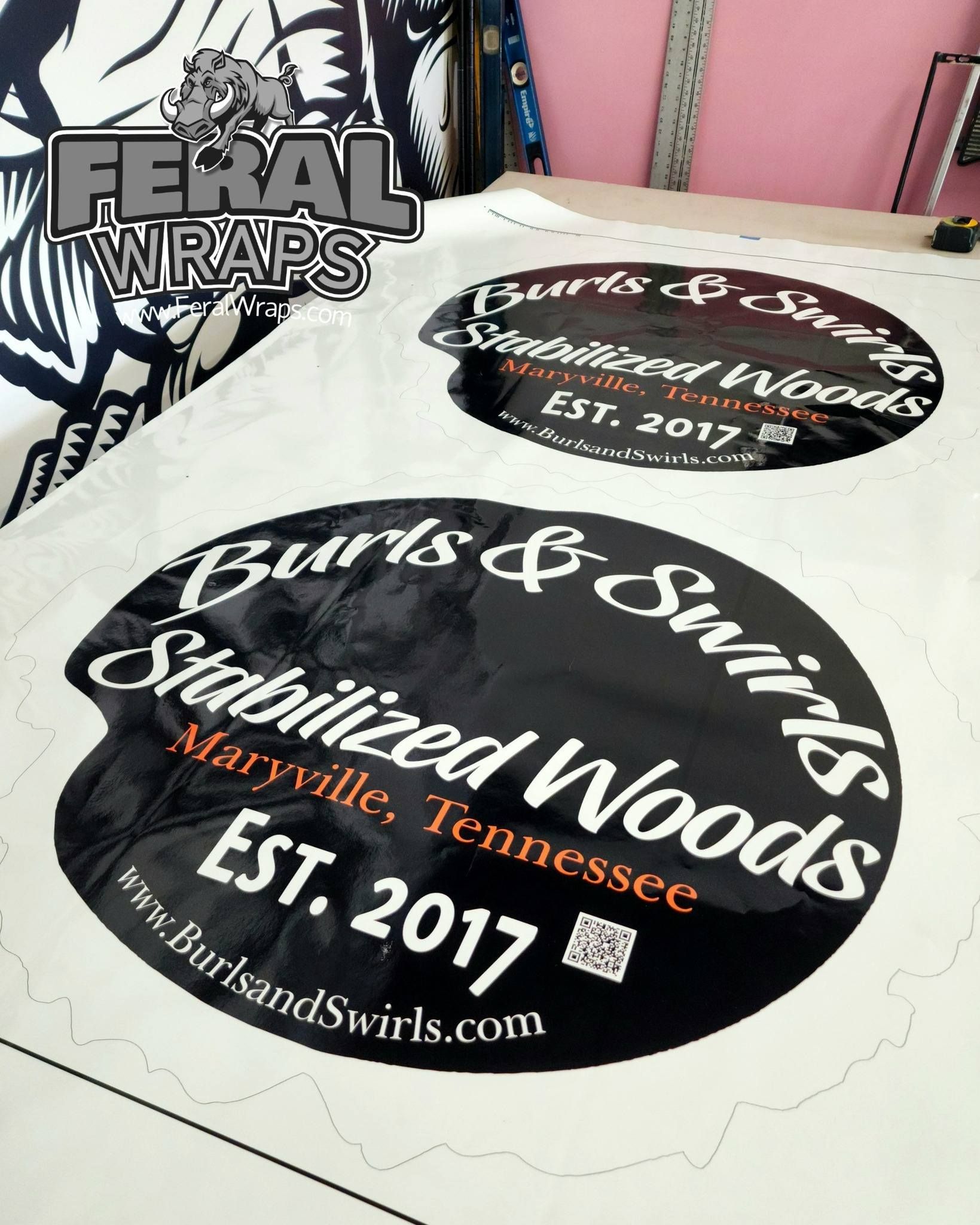 A bunch of stickers that say ' burts & swirls stabilized woods ' on them