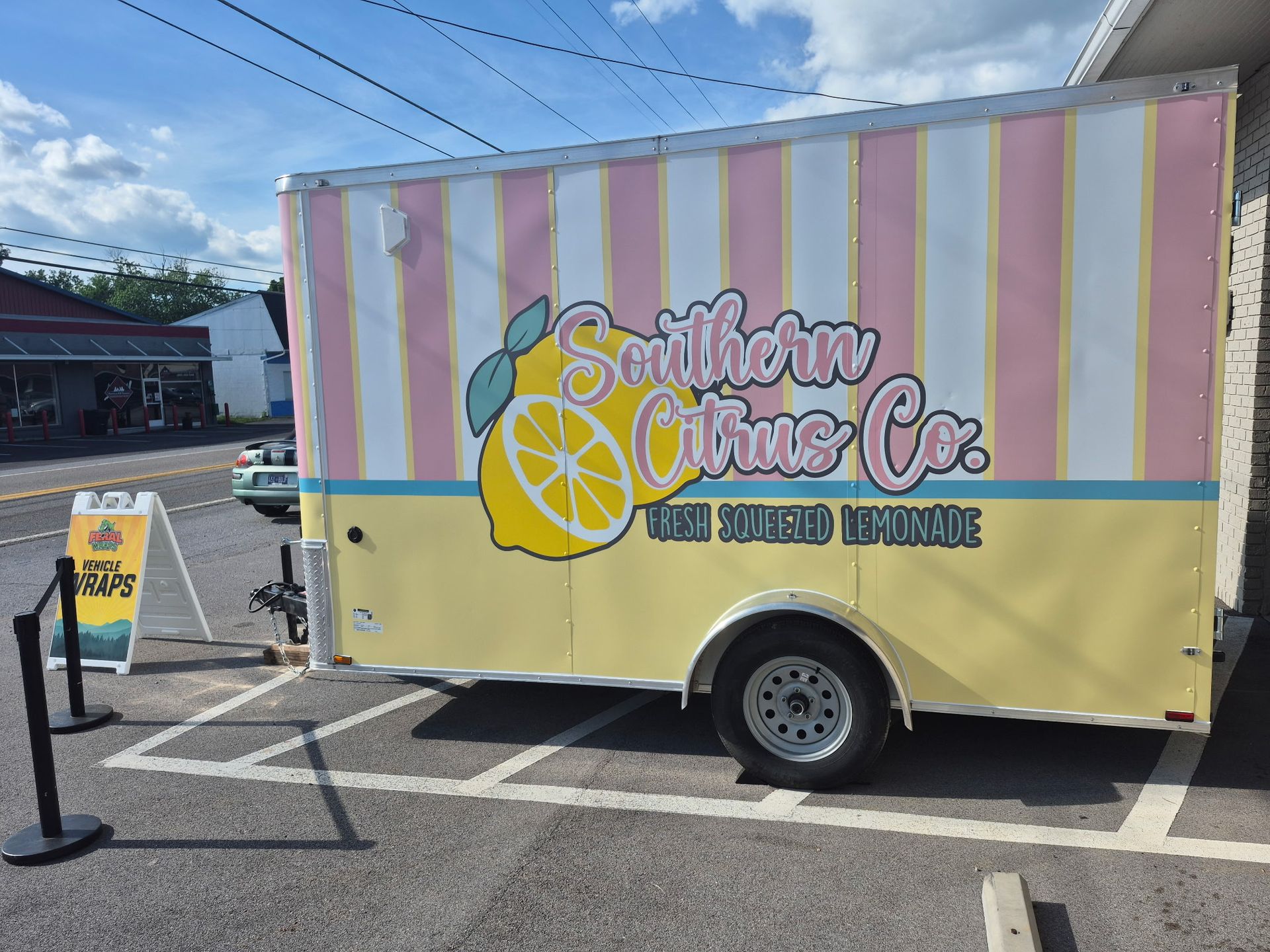 A southern citrus co. trailer is parked in a parking lot