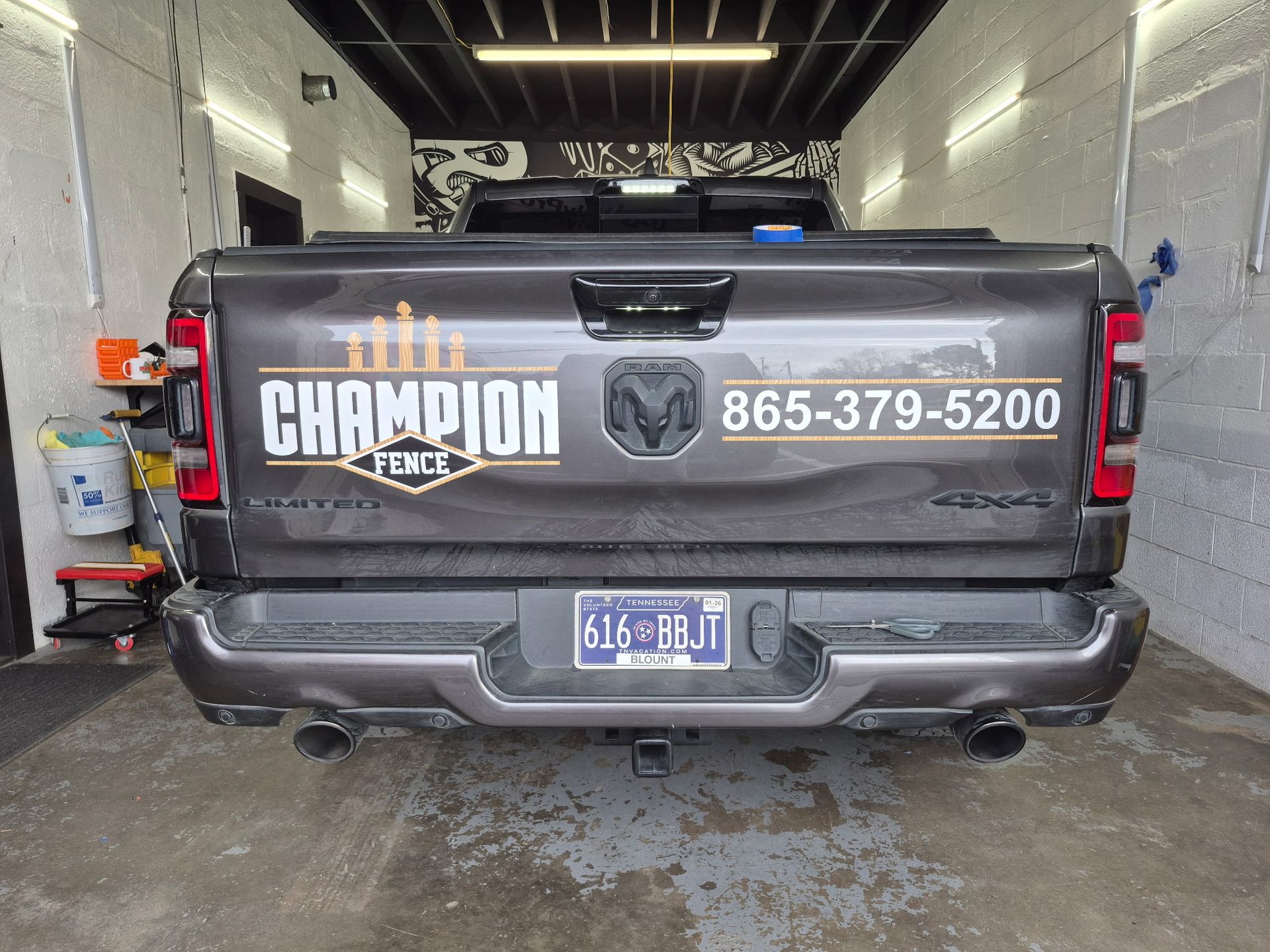 Rear view of a gray Ram truck with 