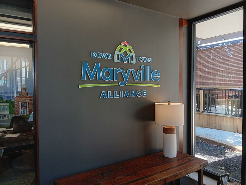 A sign on a wall that says maryville alliance