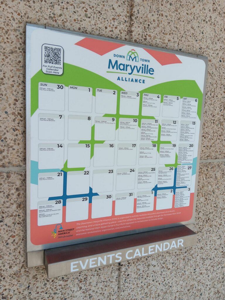 A maryville alliance calendar is hanging on a wall