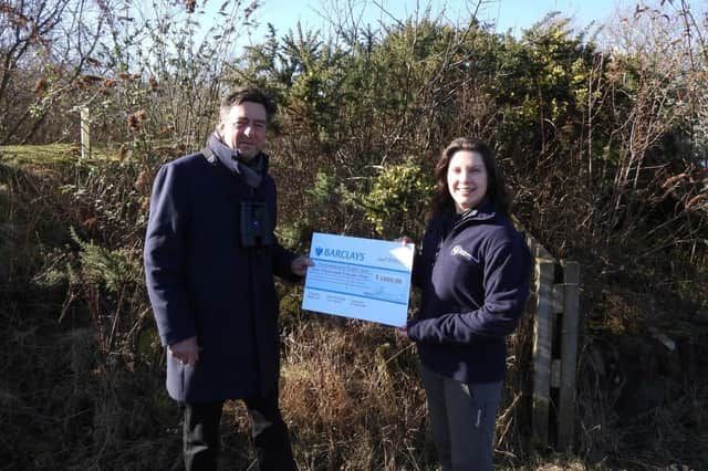 Author and artist MiE Fielding has donated £1,000 to Northumberland Wildlife Trust’s Hauxley Wildlife Discovery Centre at Druridge Bay.