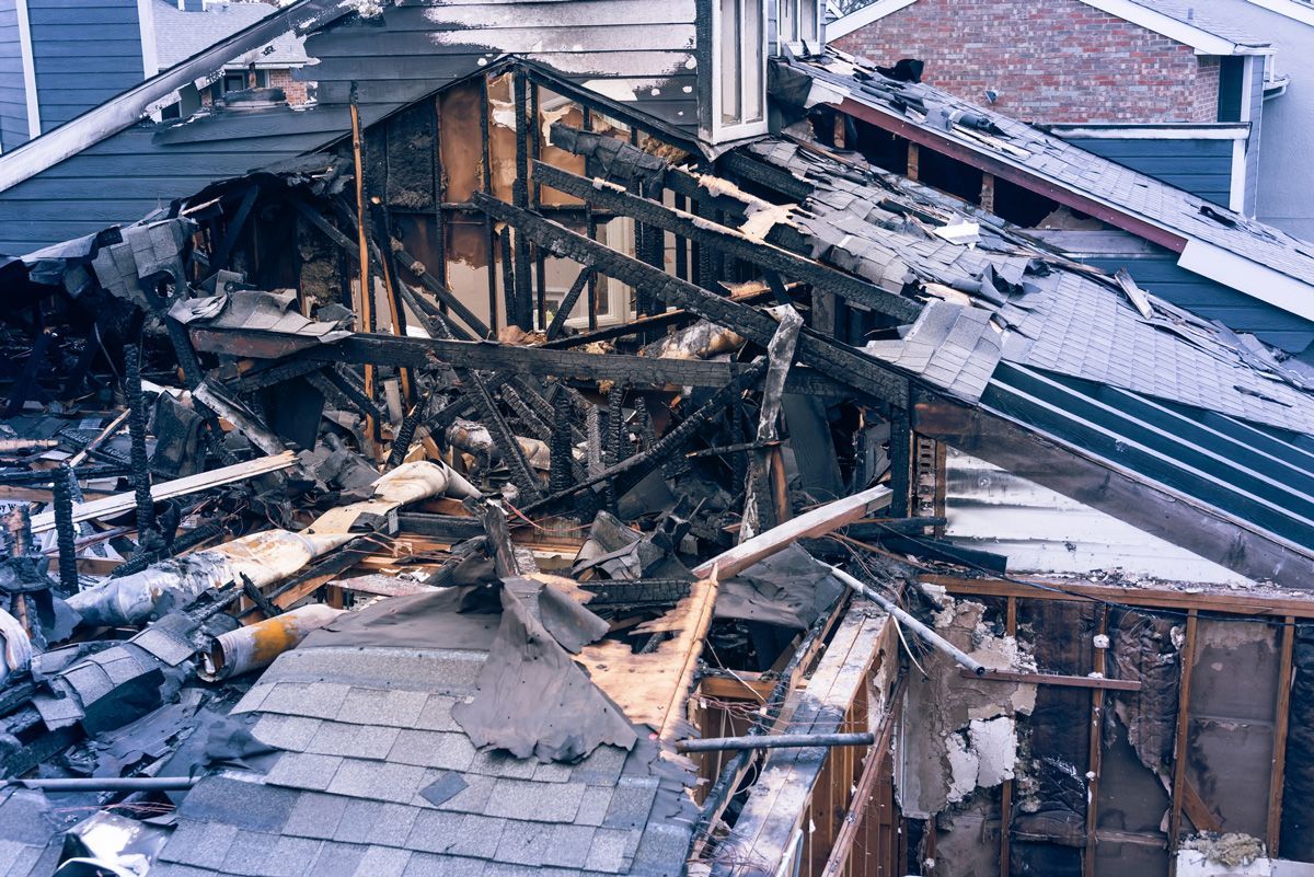Damaged House After Burned by Fire — San Antonio, TX — C. M. Ruffo General Insurance