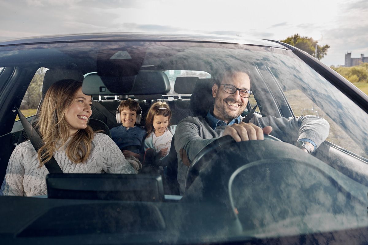 Happy Family Enjoying a Vacation by Car — San Antonio, TX — C. M. Ruffo General Insurance