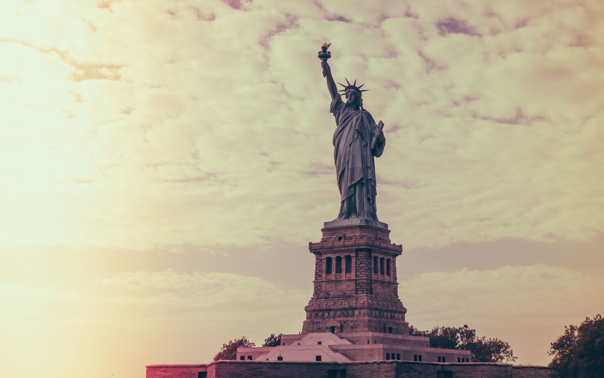 The statue of liberty is a very tall statue in new york city.