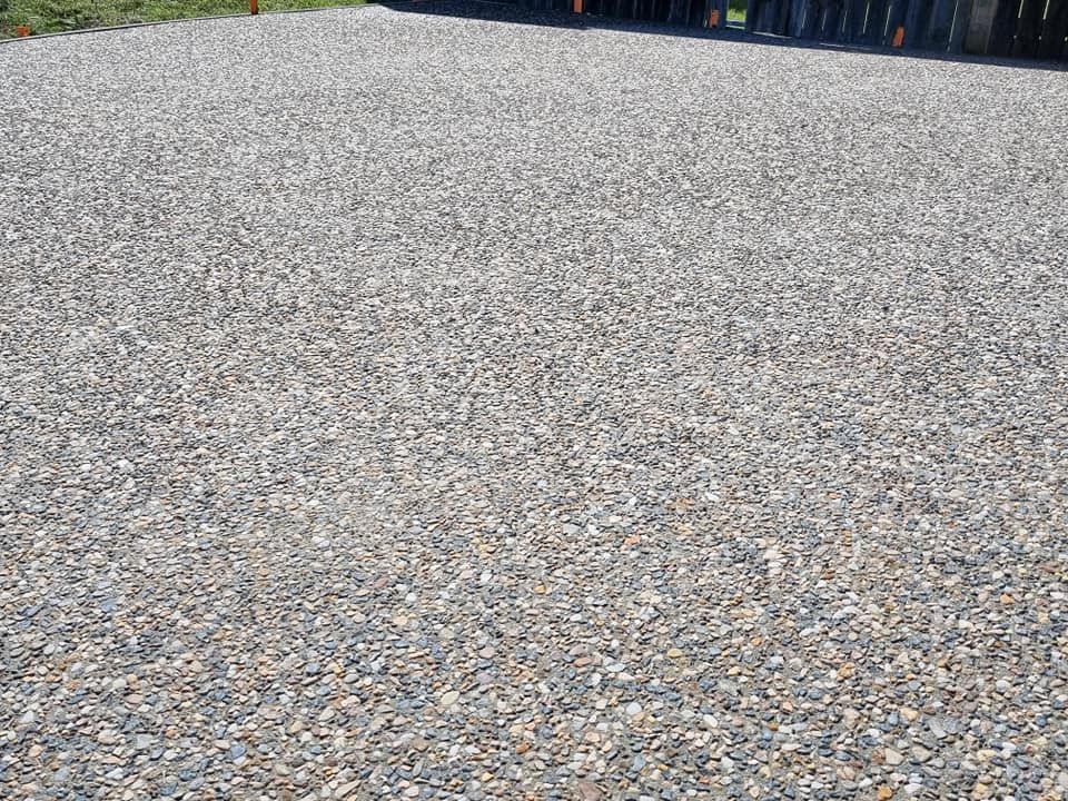Close-up of a Gravel Surface, Showing Small, Varied-color Stones — SRS Concreting In Glenvale, QLD
