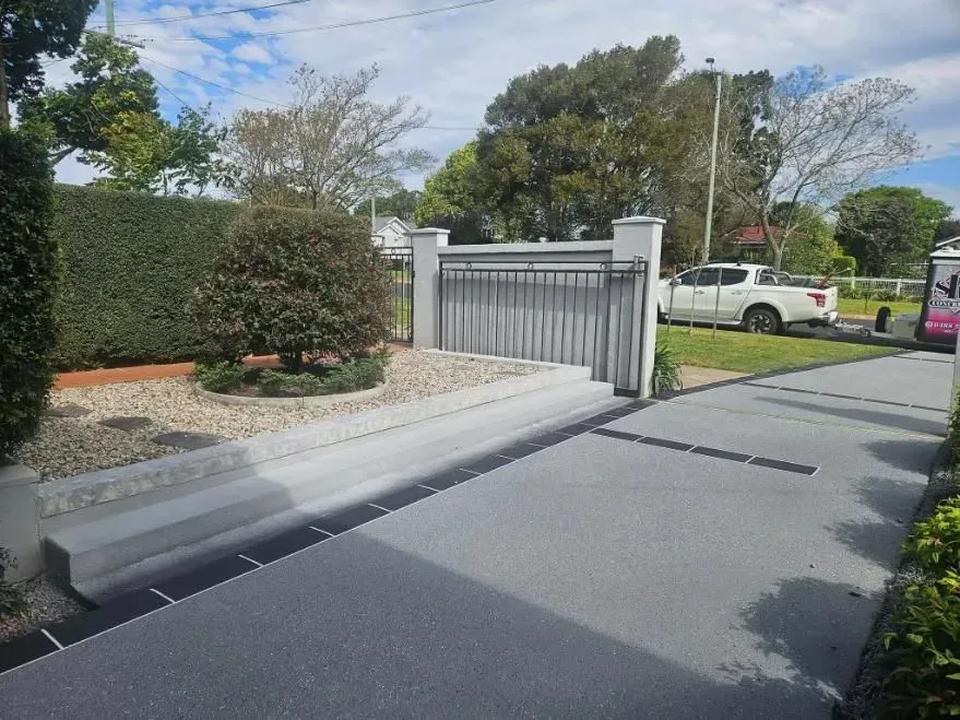 Driveway With Concrete Steps Leading to Gate — SRS Concreting In Toowoomba, QLD