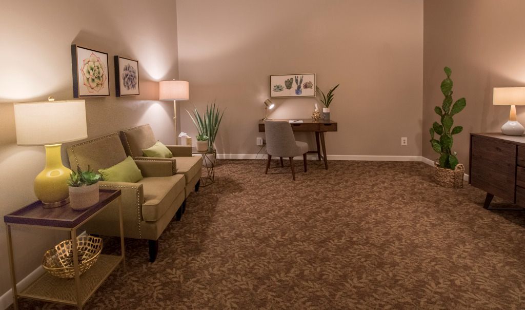 A large room filled with tables and chairs.