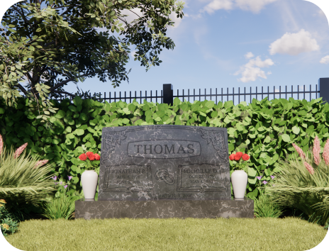 A gravestone with the name thomas on it in a garden