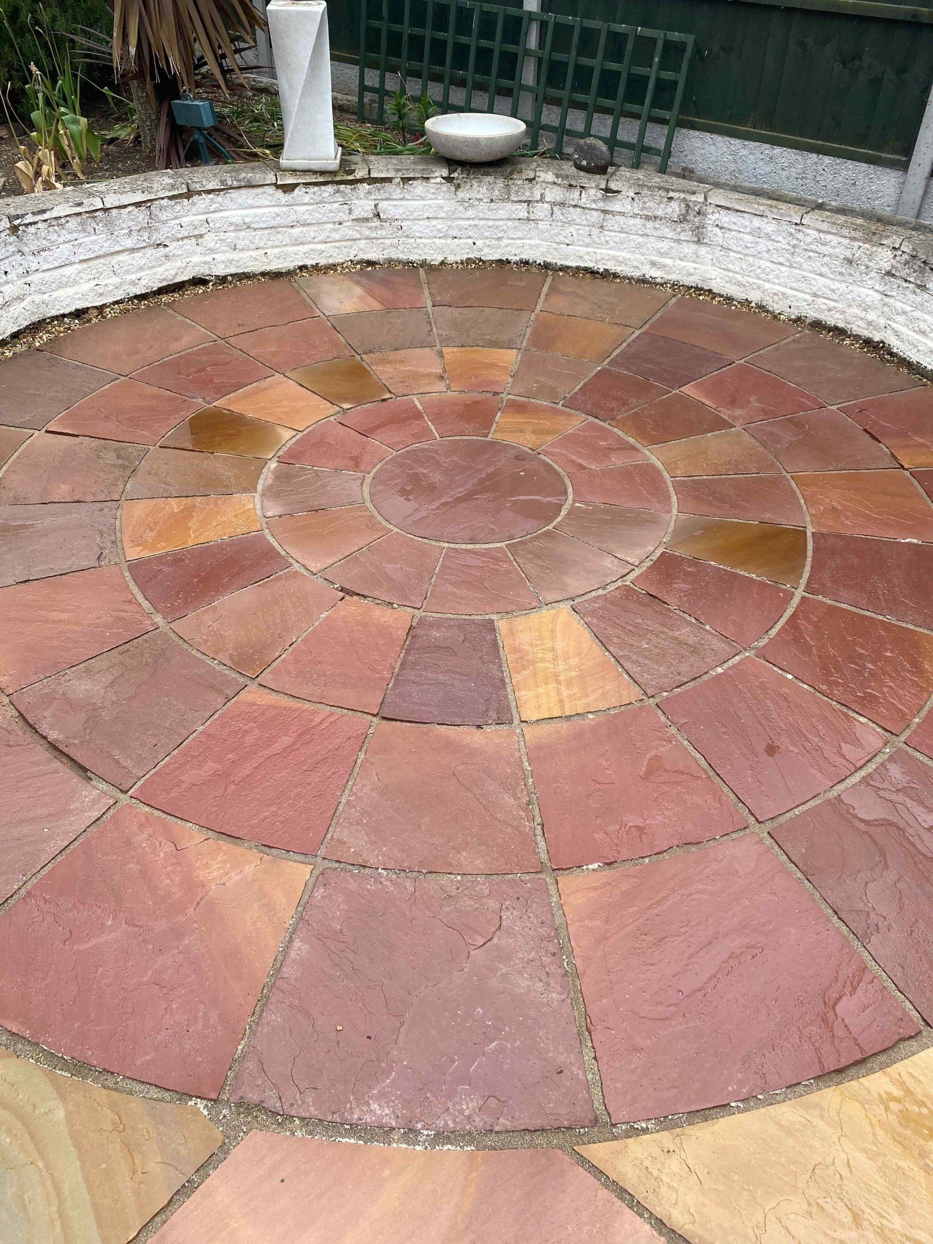 natural sandstone patio cleaned and restored by squeaky solihull