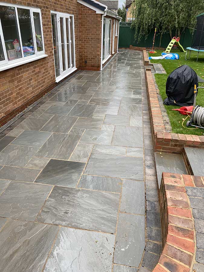 Solihull natural stone patio cleaned after