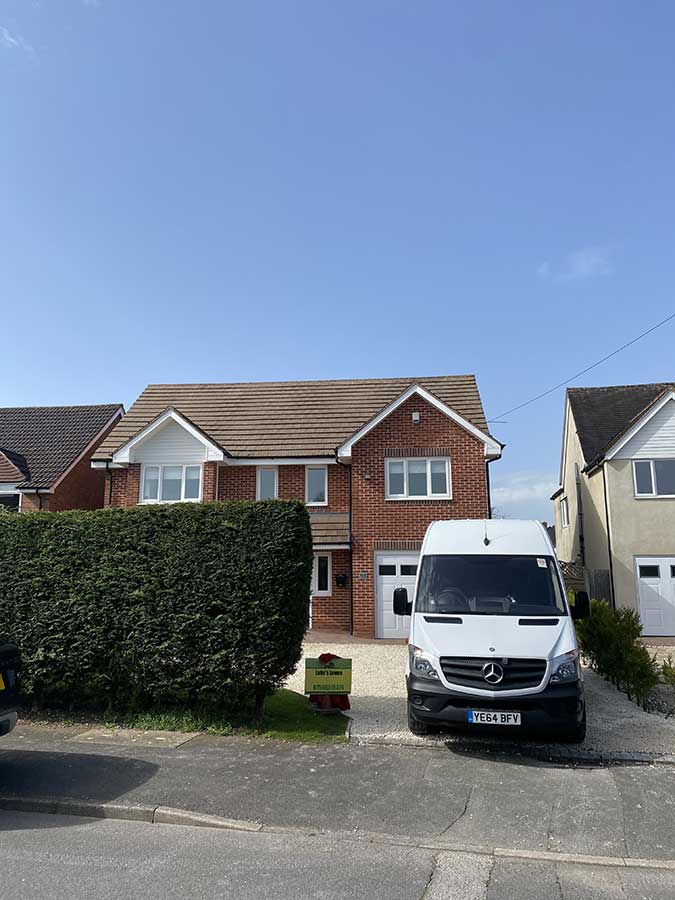 Solihull flat roof tiles cleaned and moss free