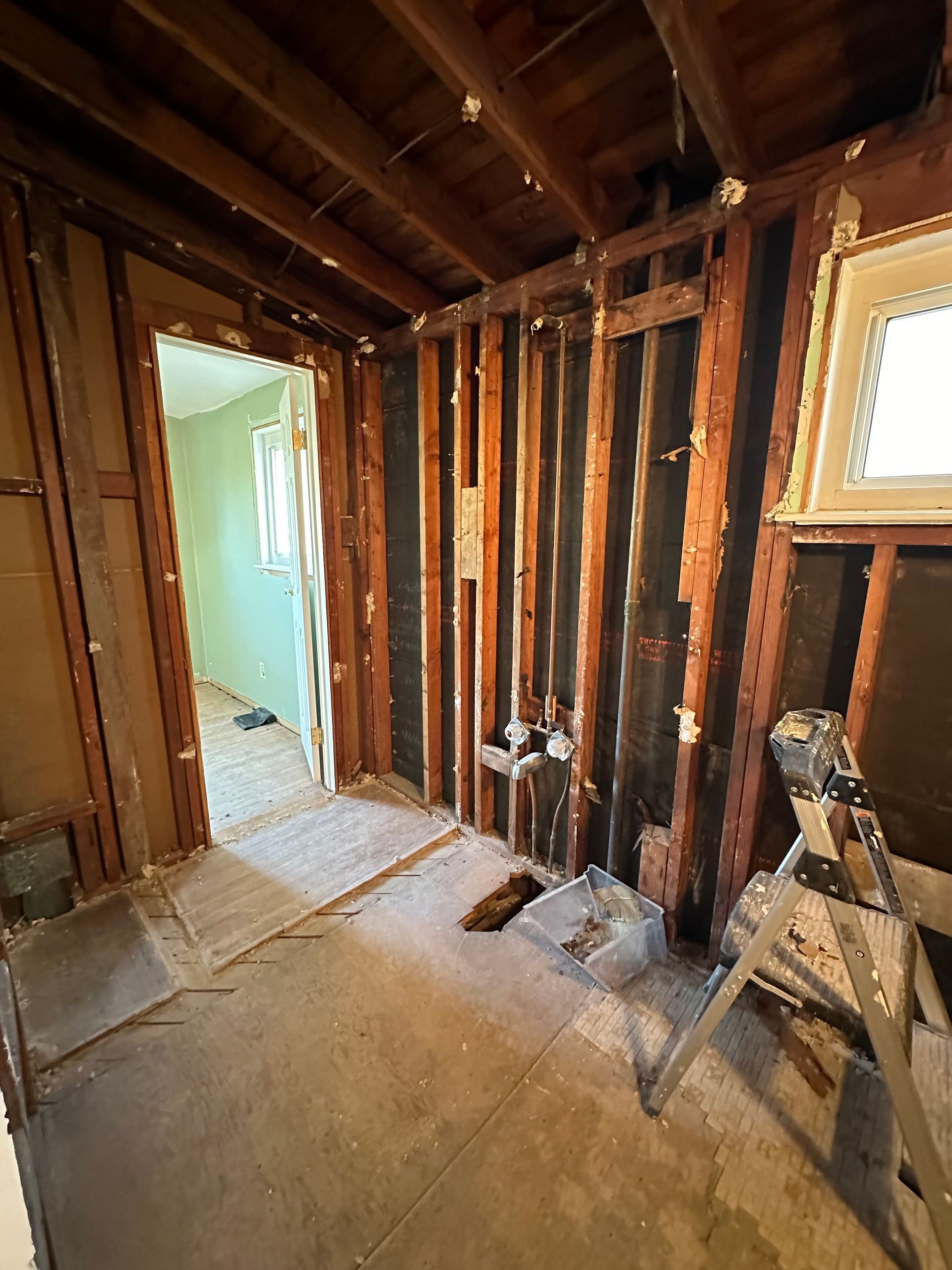 A room under construction and a window in it.