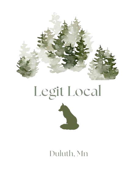 A logo for legit local duluth mn with a wolf