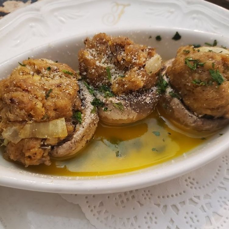 A close up of a plate of food with the letter j on it