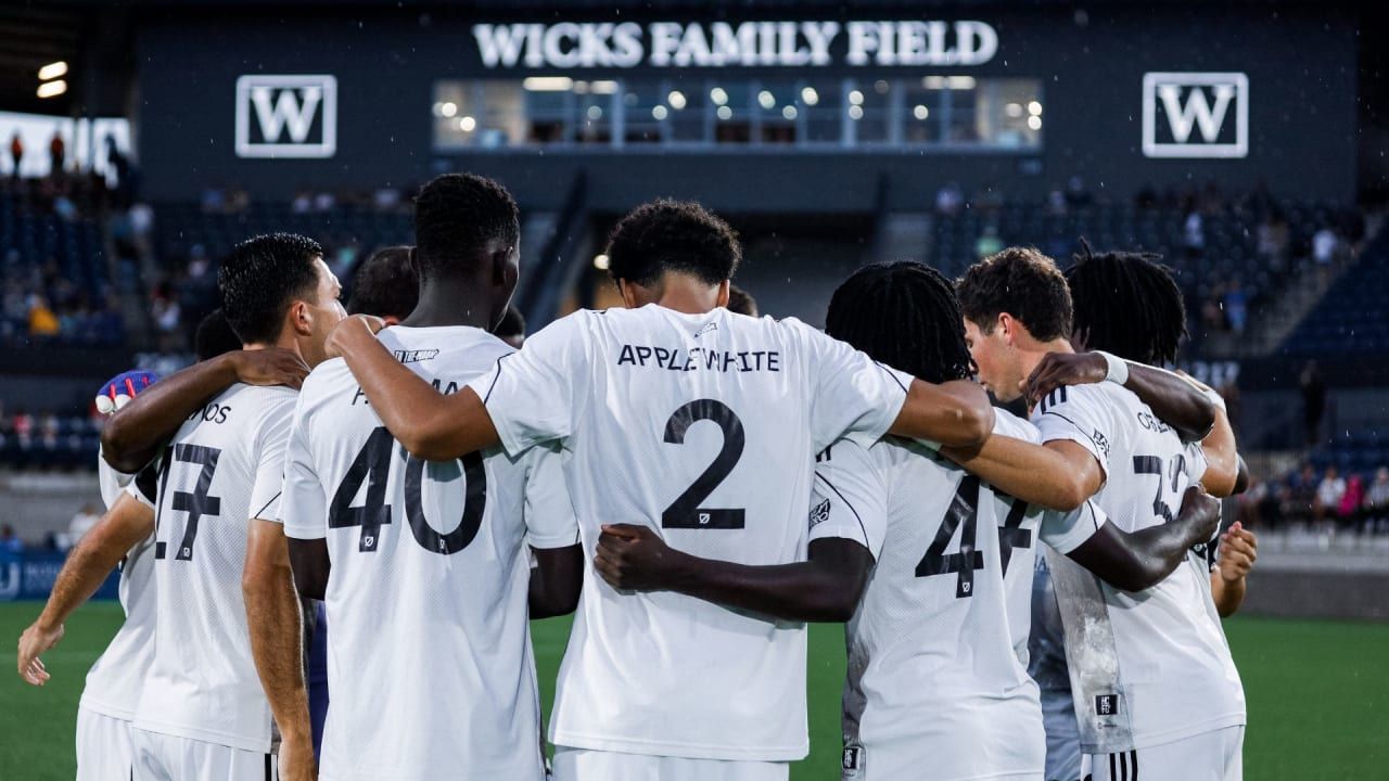 Chris Applewhite in a team huddle.