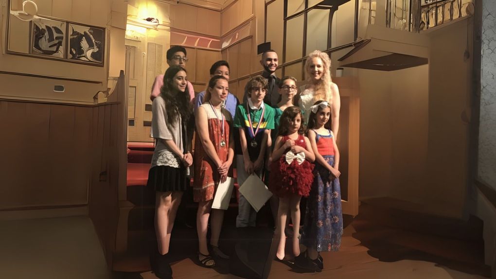 A group of people are posing for a picture in a room.