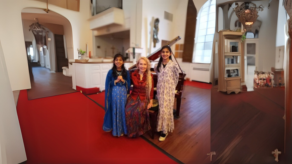 Three women are posing for a picture in a room with a red carpet.