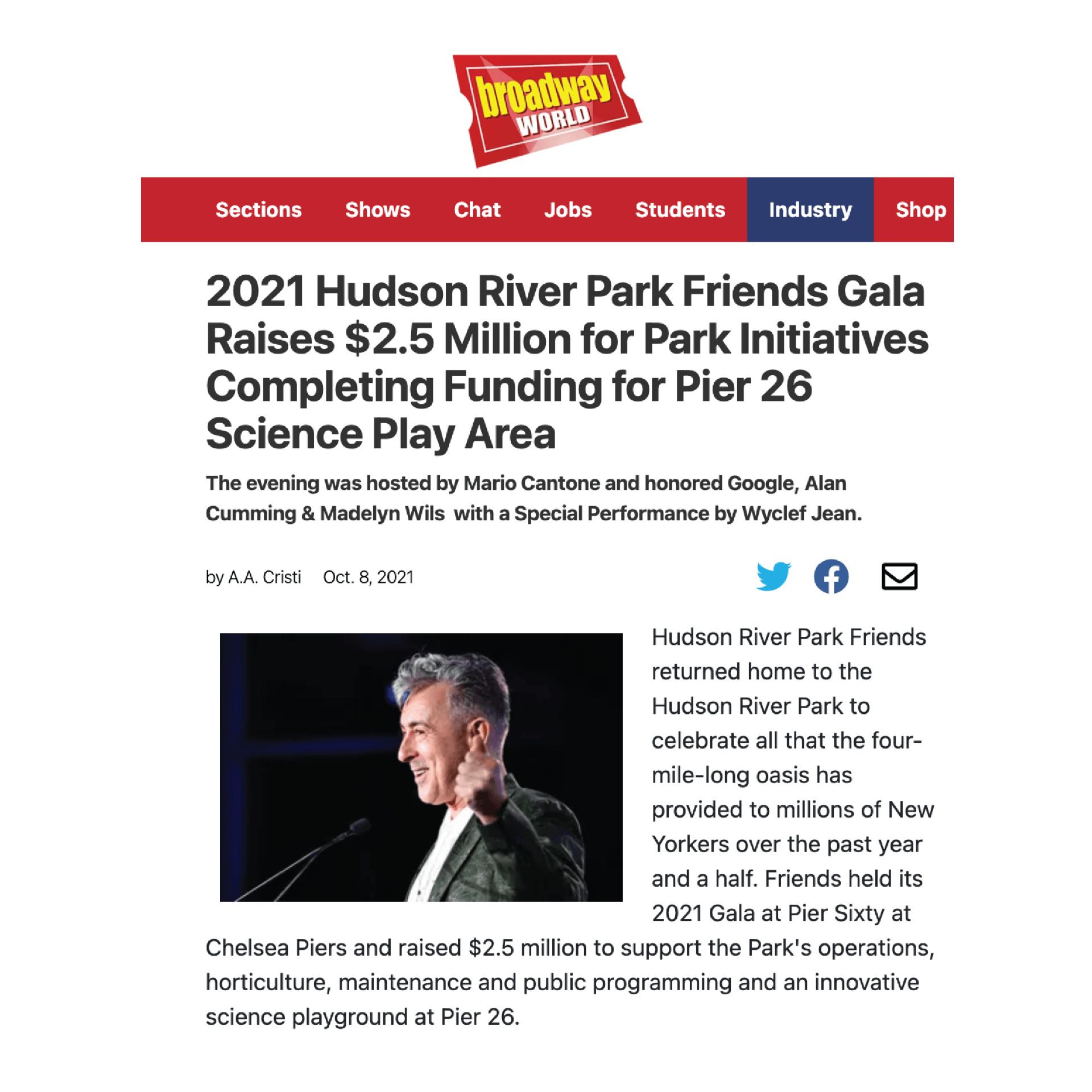 A man is giving a speech at a science play area.