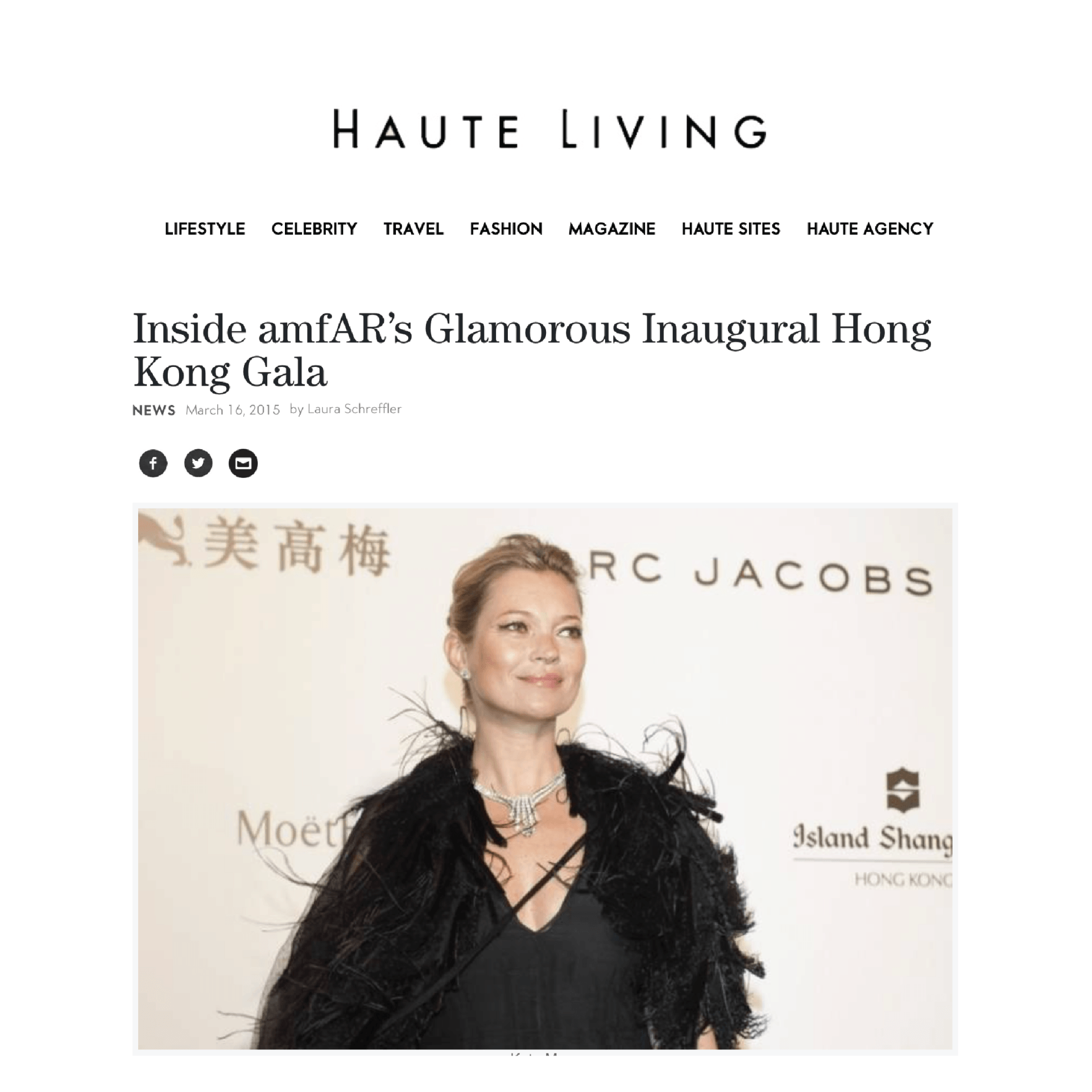 A woman is standing in front of a red carpet.