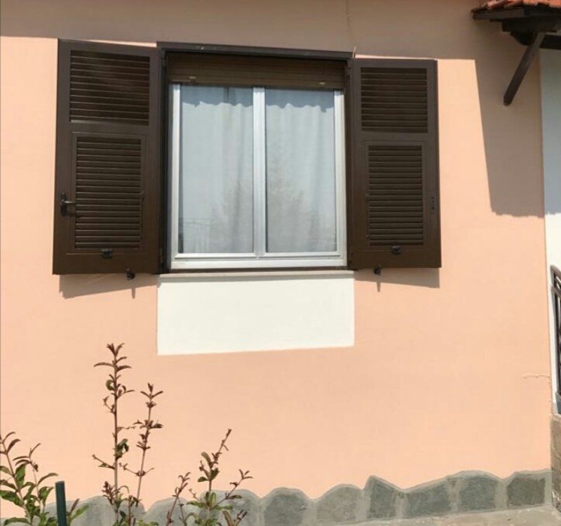 Finestra con persiana