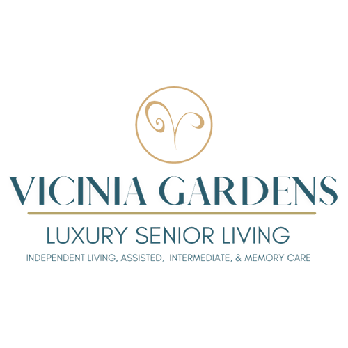 Logo for Vicinia Gardens Luxury Senior Living, featuring a gold circular emblem and teal text on a white background.