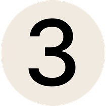 Black number 3 in a beige circle.