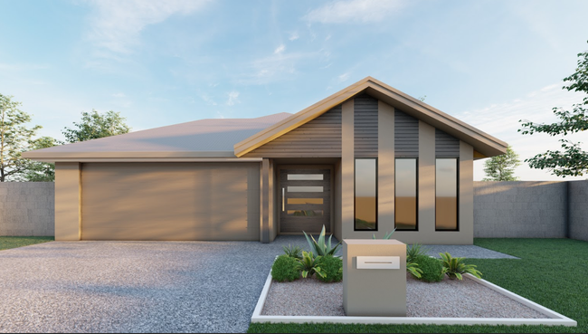 Modern beige house with a driveway, garage, and front yard landscaping.