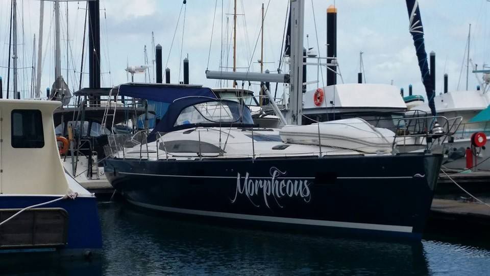 A Boat With the Name Morpheus on It is Docked in a Marina — Custom Unique Trimming in Mackay, QLD