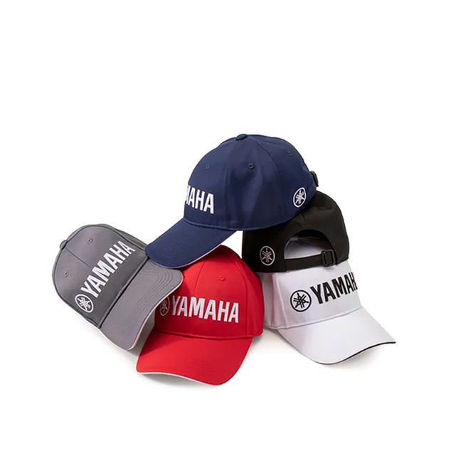 A group of yamaha hats are stacked on top of each other