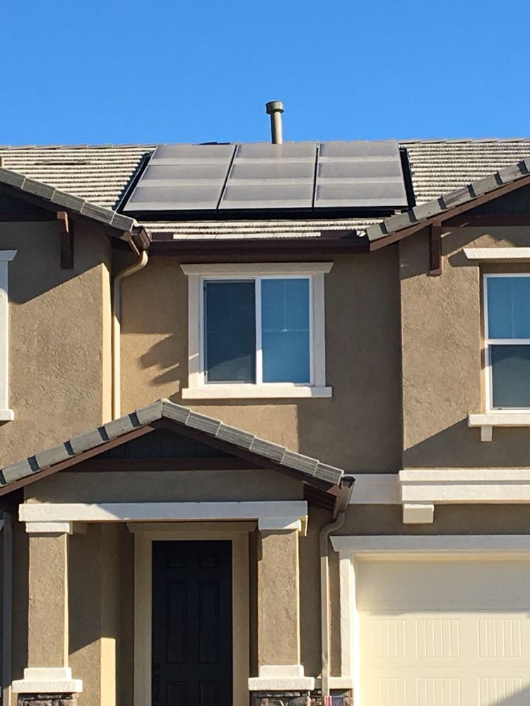 A house with solar panels on the roof