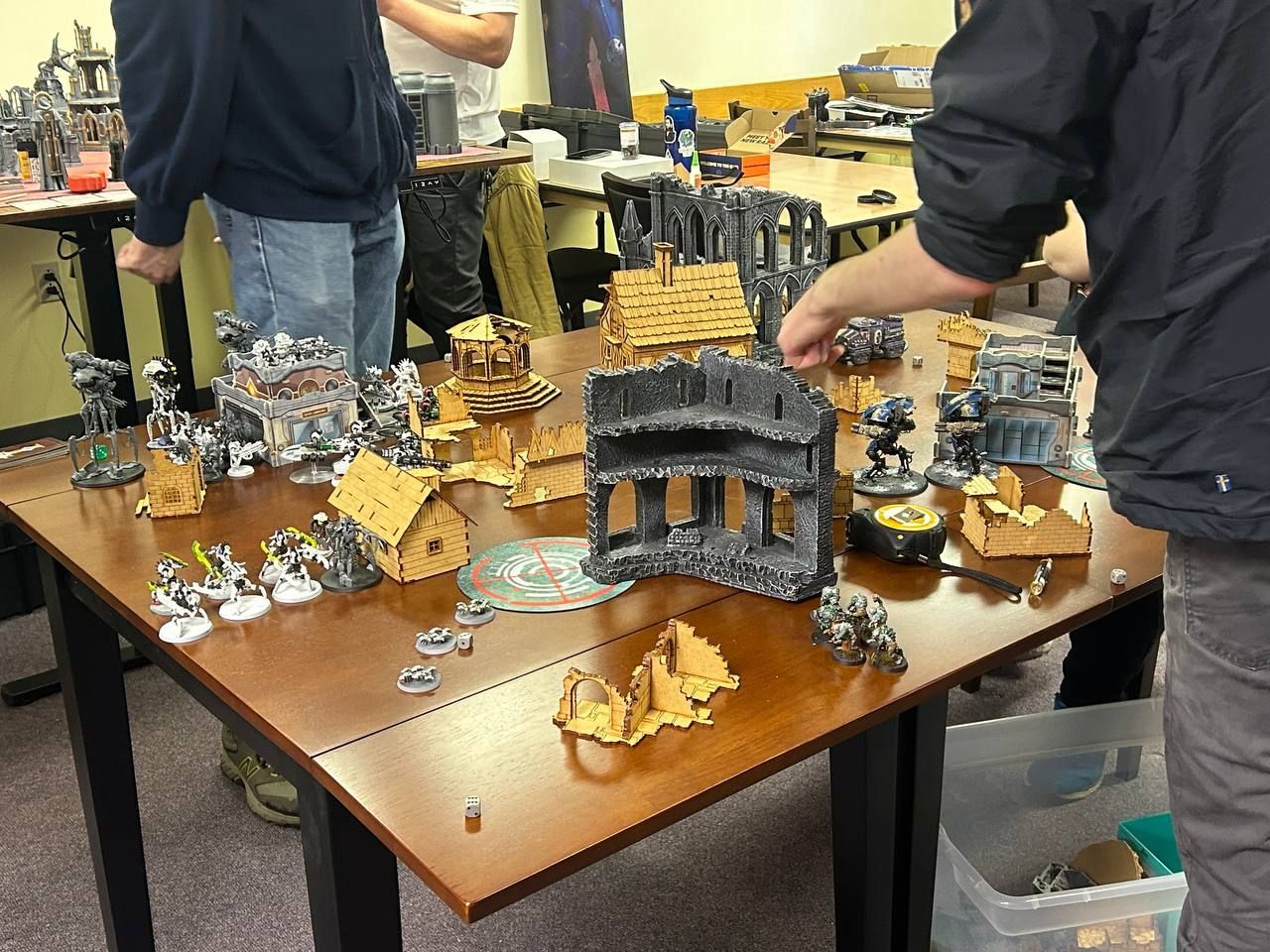 A table with a lot of miniature figures on it