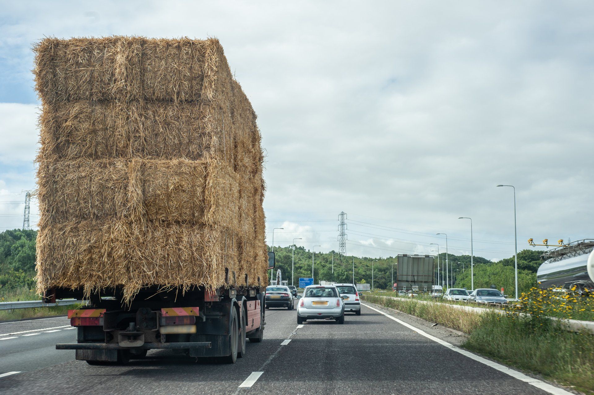Truck Carrying Cartage Of Hay  — Gympie Towing in Kybong, QLD