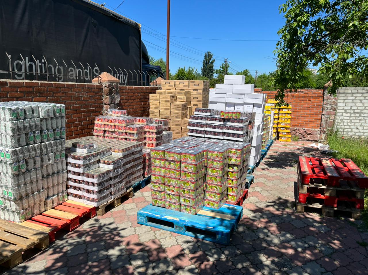 Stacked tins and packages of food deliveries