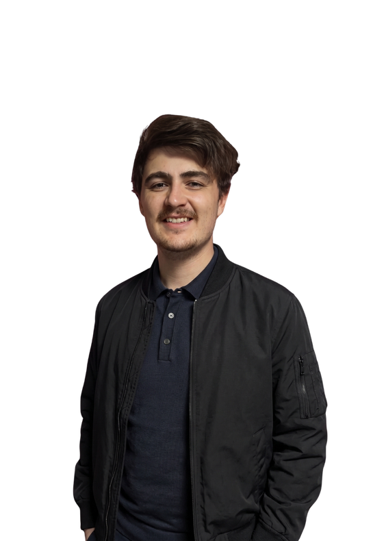 Smiling person in a black jacket and dark shirt, standing against a white background.