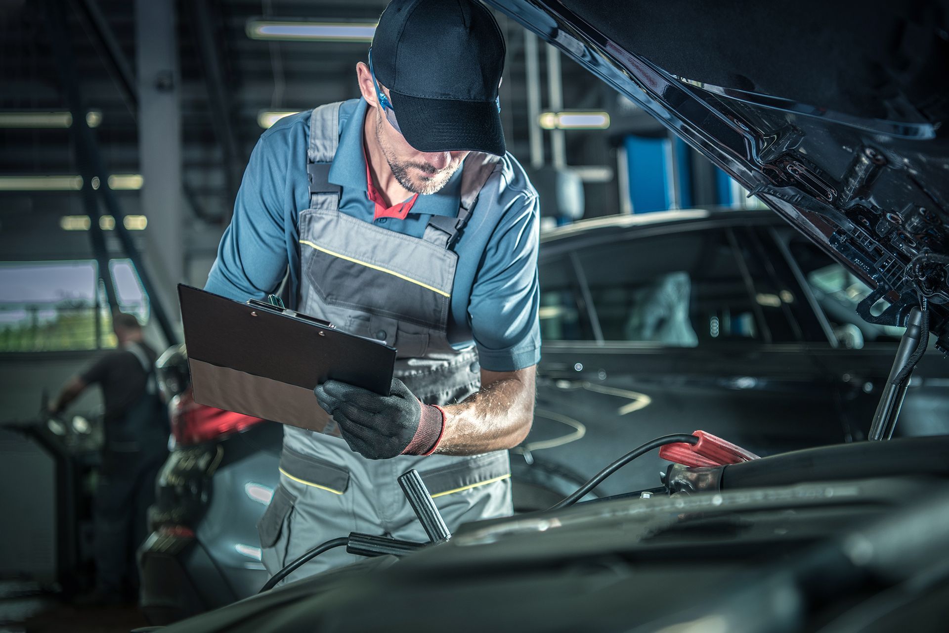 Mechanic Working On a Car