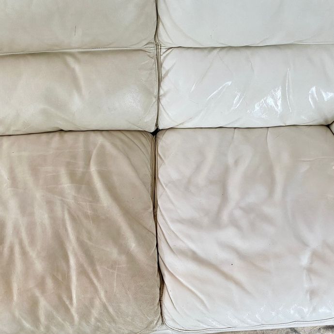 Two white cushions with blue trim are sitting next to each other — Furniture & Auto Pride In Port Macquarie, NSW