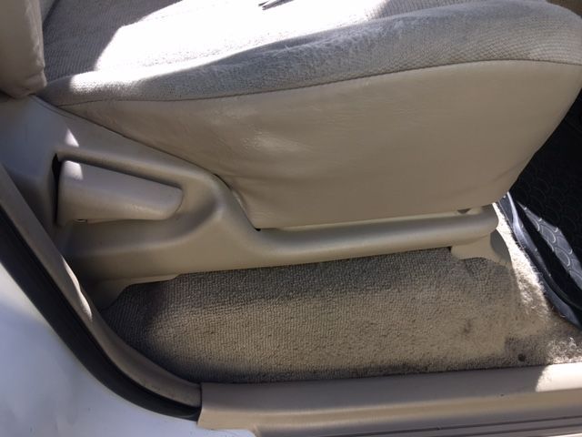 A Close Up of a Car Seat With the Door Open — Furniture & Auto Pride In Port Macquarie, NSW
