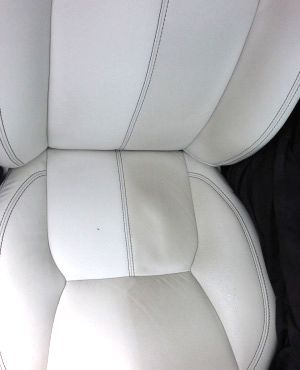 A Close Up of a White Leather Seat in a Car — Furniture & Auto Pride In Port Macquarie, NSW