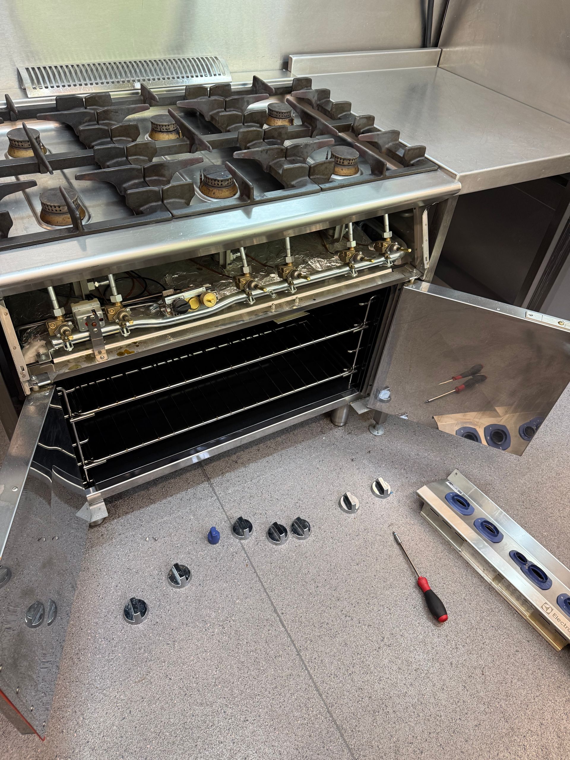 Lucas Plumbing & Heating engineer testing gas pipework in catering premises